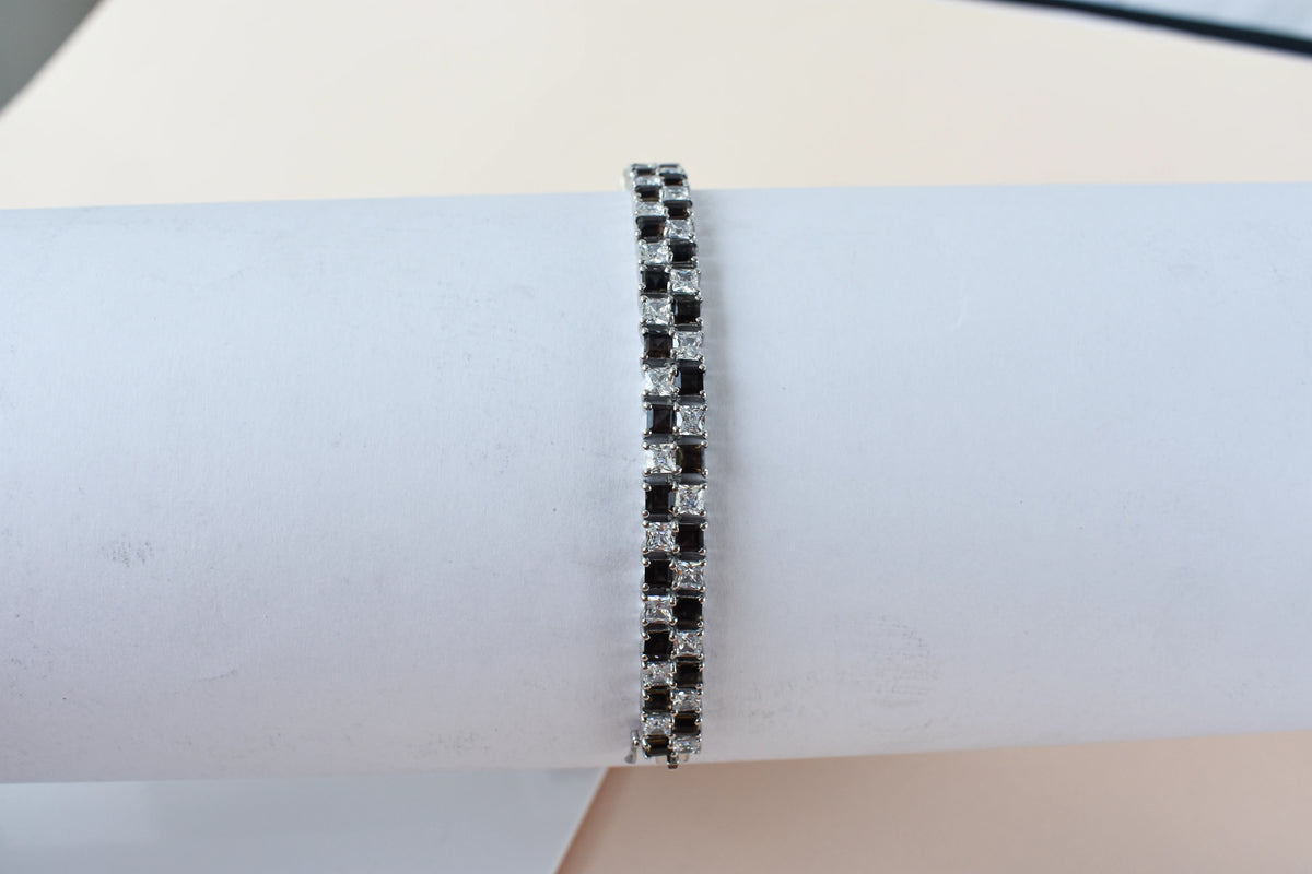 Black and white checkerboard tennis bracelet in silver