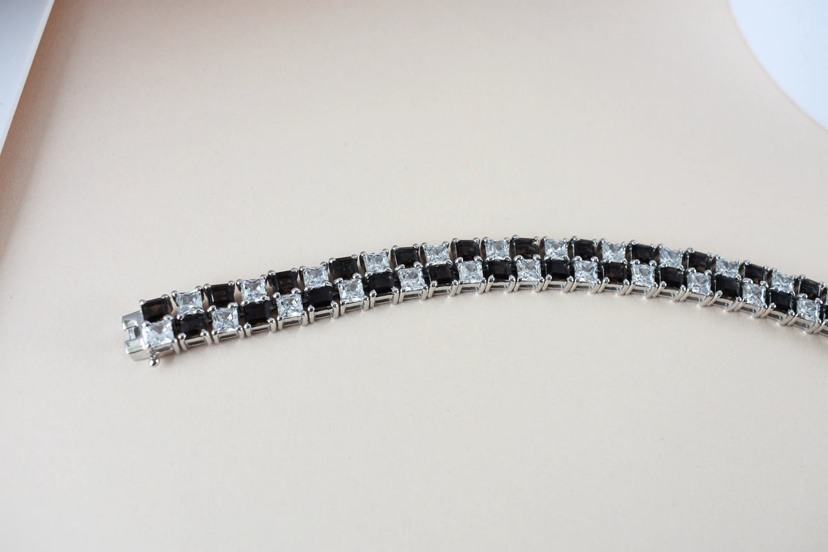 Black and white checkerboard tennis bracelet in silver