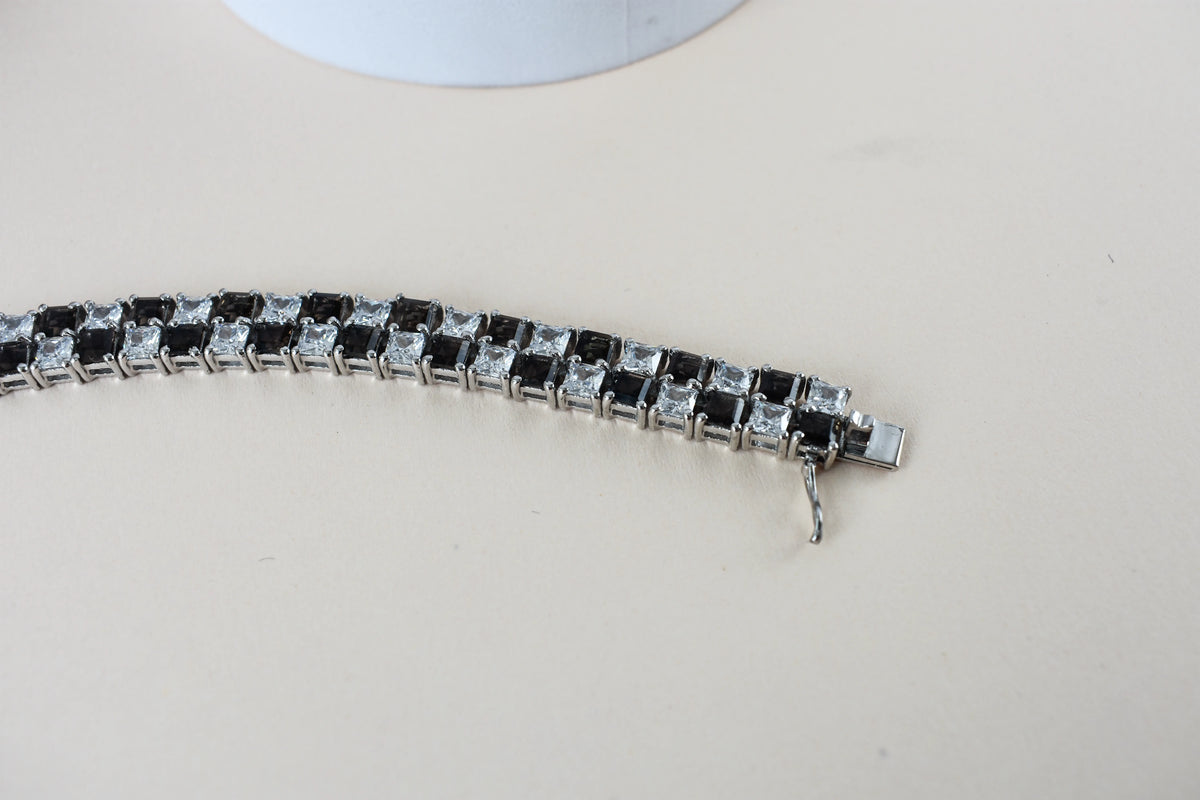 Black and white checkerboard tennis bracelet in silver