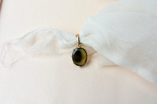 10K gold pendant with oval bi-color tourmaline