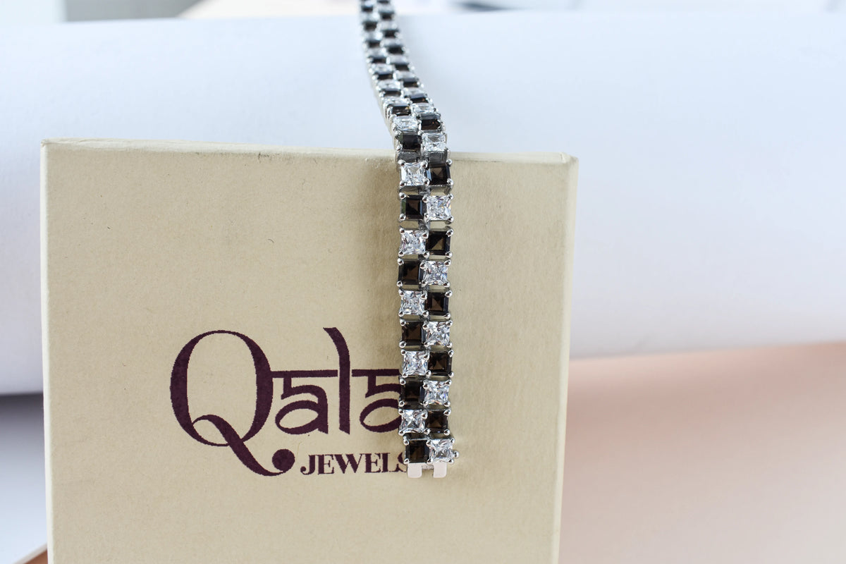 Black and white checkerboard tennis bracelet in silver
