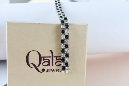 Black and white checkerboard tennis bracelet in silver