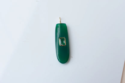 18K gold pendant with elongated green onyx slab and accent stone
