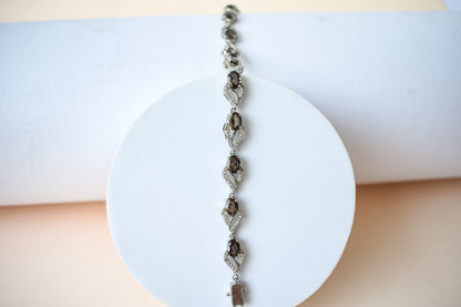 Genuine smoky quartz and white cubic zirconia bracelet in 925 silver wave link design