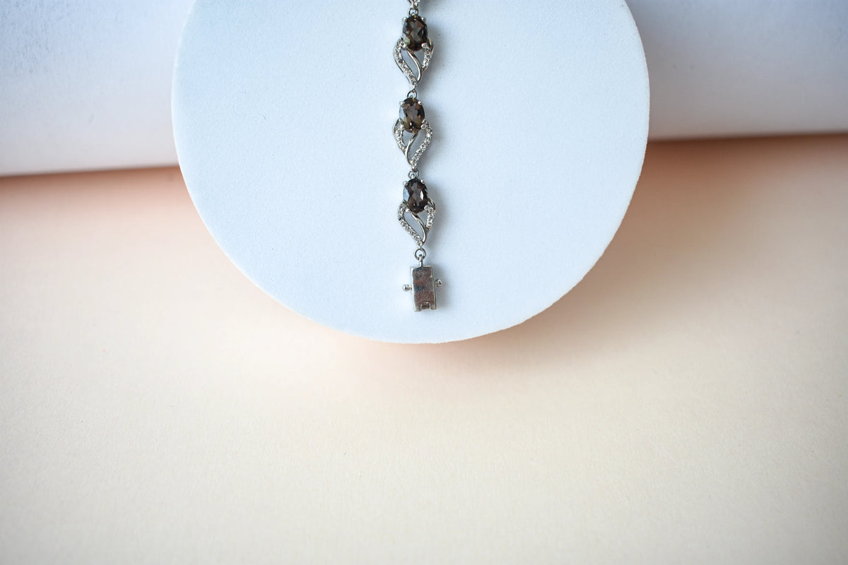 Genuine smoky quartz and white cubic zirconia bracelet in 925 silver wave link design