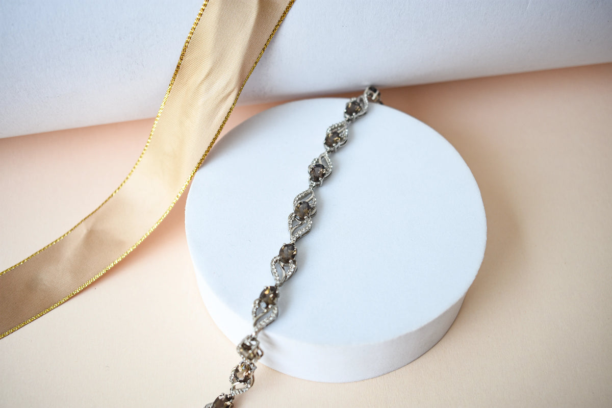 Genuine smoky quartz and white cubic zirconia bracelet in 925 silver wave link design