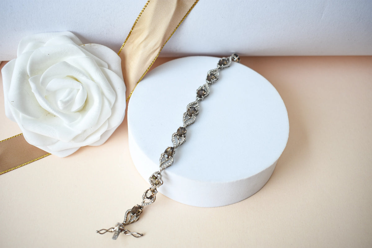 Genuine smoky quartz and white cubic zirconia bracelet in 925 silver wave link design