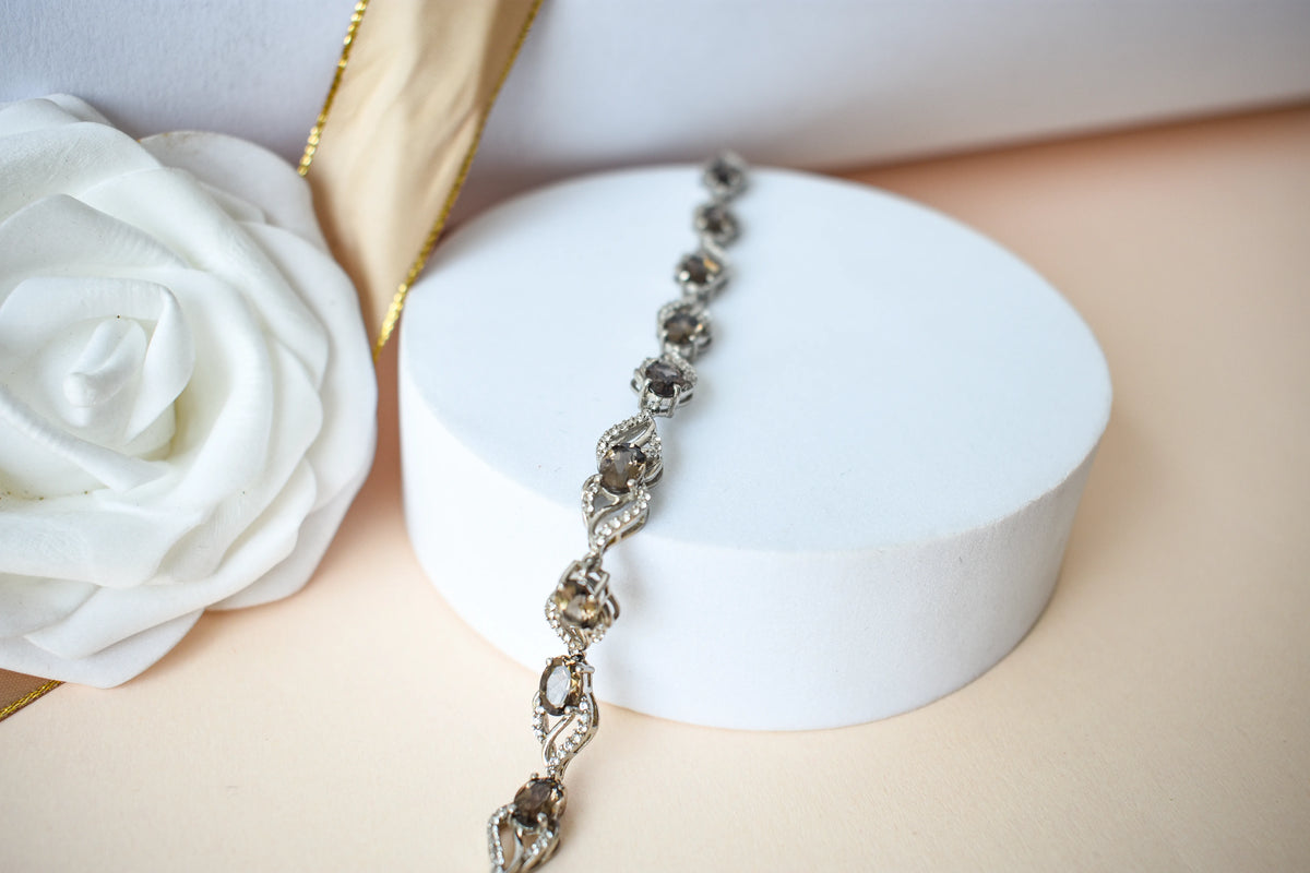 Genuine smoky quartz and white cubic zirconia bracelet in 925 silver wave link design