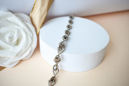 Genuine smoky quartz and white cubic zirconia bracelet in 925 silver wave link design