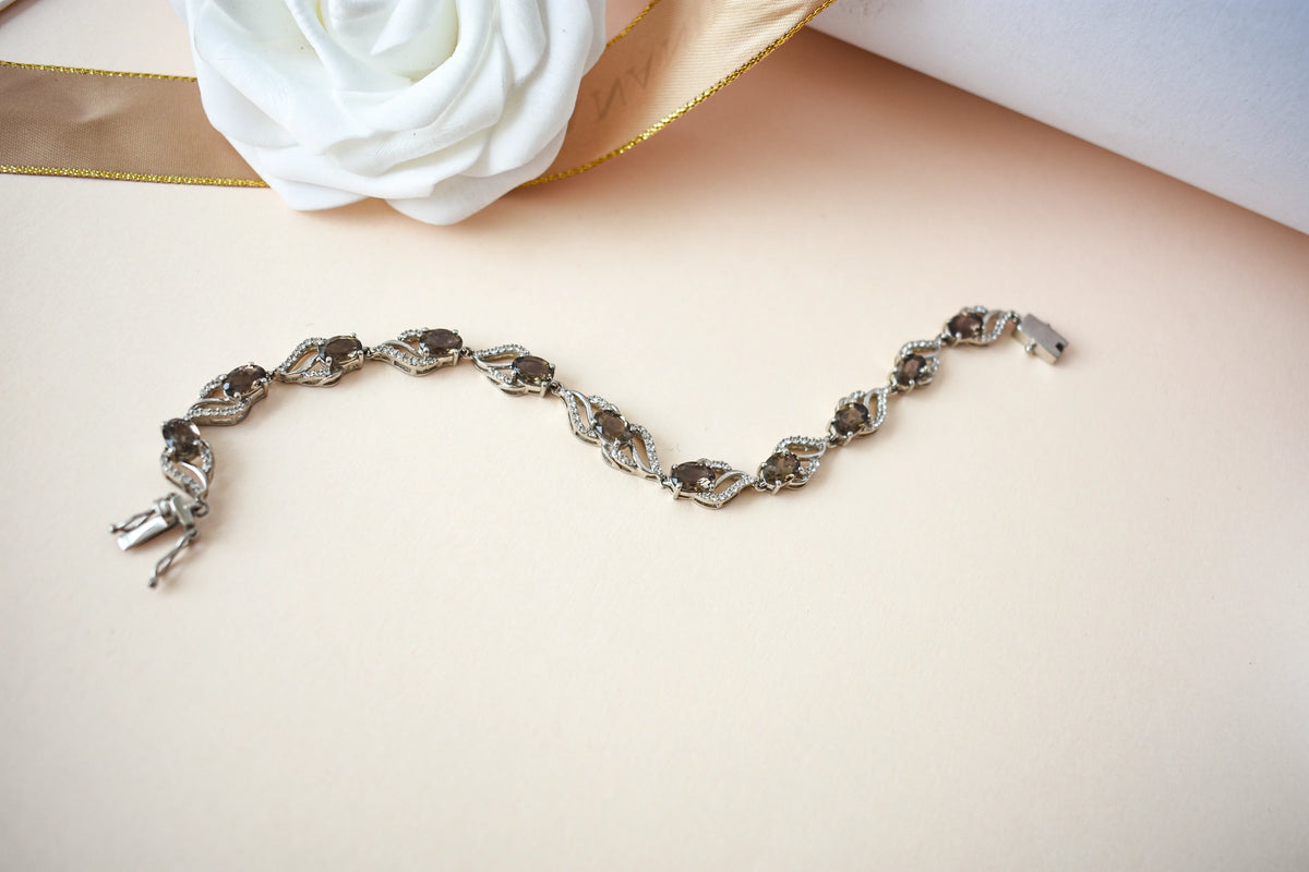 Genuine smoky quartz and white cubic zirconia bracelet in 925 silver wave link design