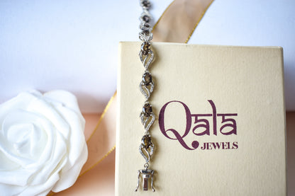 Genuine smoky quartz and white cubic zirconia bracelet in 925 silver wave link design