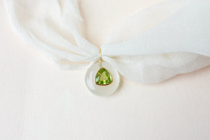 18K gold pendant with diamond pavé bitten apple design