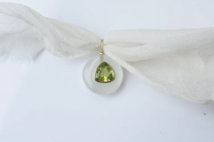 18K gold pendant with diamond pavé bitten apple design