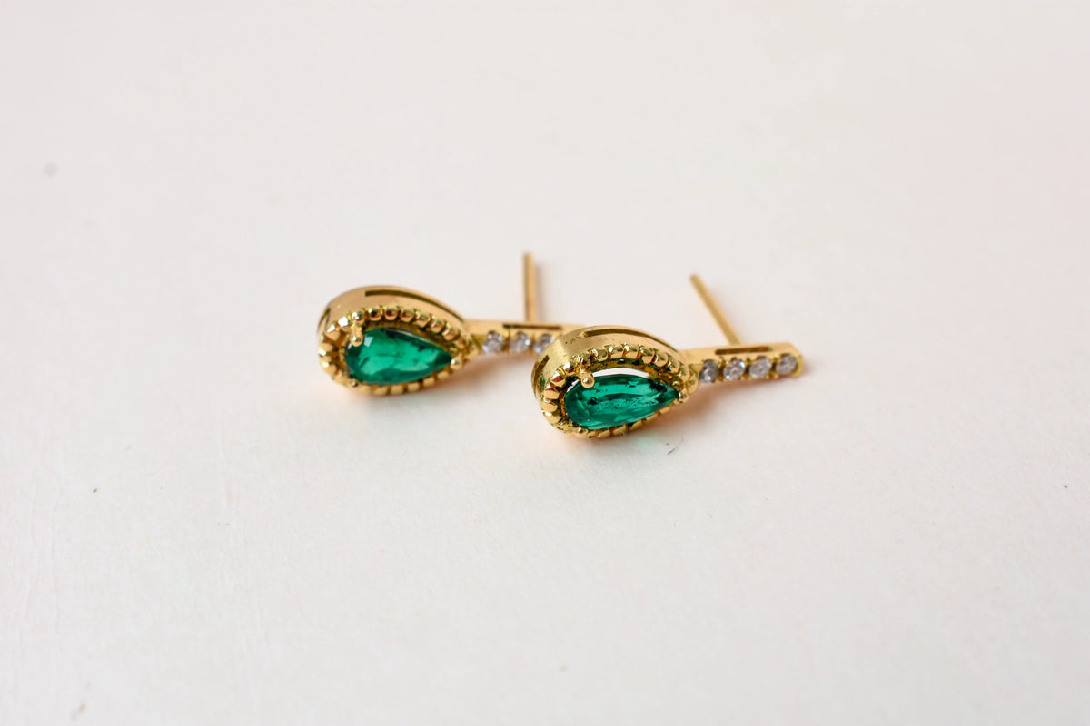 18K gold stud earrings with emerald and diamond accents