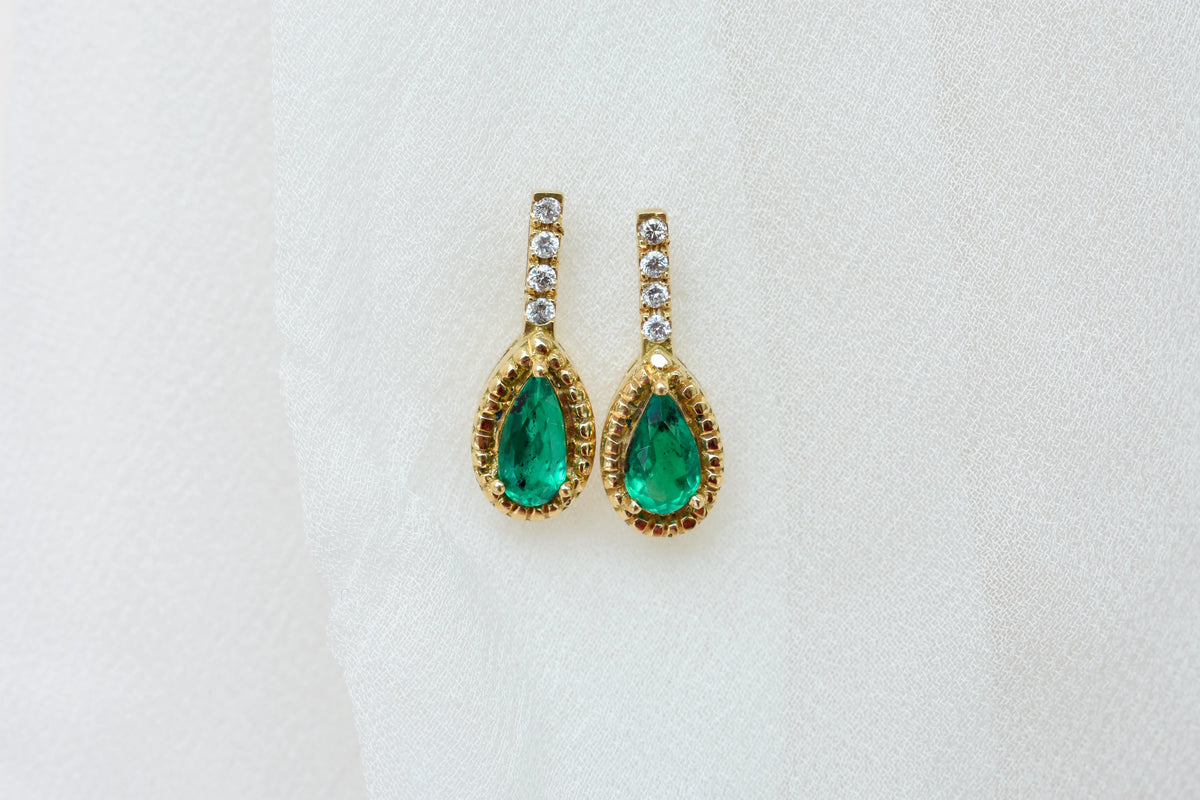 18K gold stud earrings with emerald and diamond accents