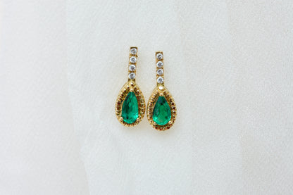 18K gold stud earrings with emerald and diamond accents