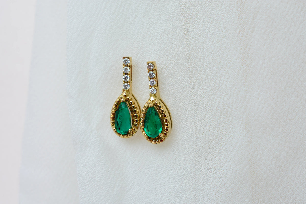 18K gold stud earrings with emerald and diamond accents