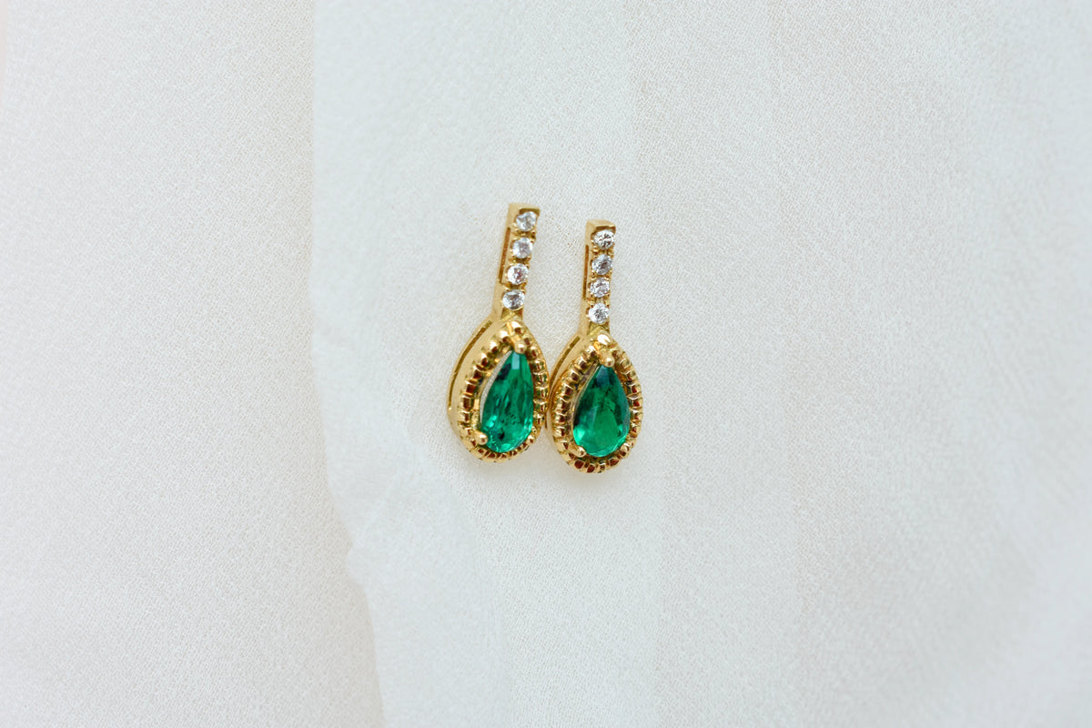 18K gold stud earrings with emerald and diamond accents