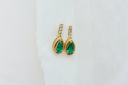 18K gold stud earrings with emerald and diamond accents
