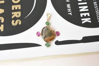 18K gold cross pendant with tourmaline, ruby, and emerald