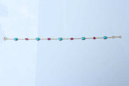 18K gold bracelet with turquoise and ruby stations