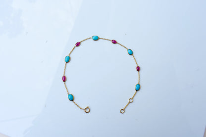 18K gold bracelet with turquoise and ruby stations