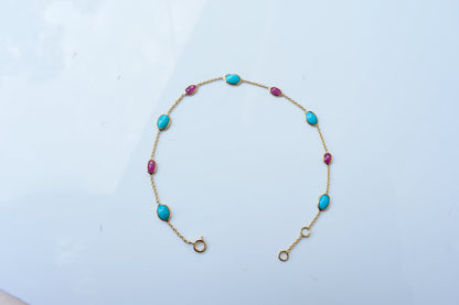 18K gold bracelet with turquoise and ruby stations