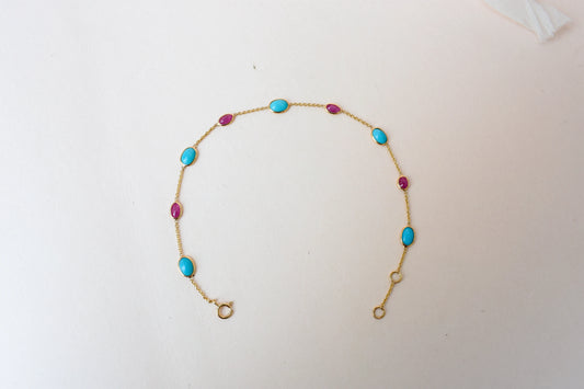 18K gold bracelet with turquoise and ruby stations