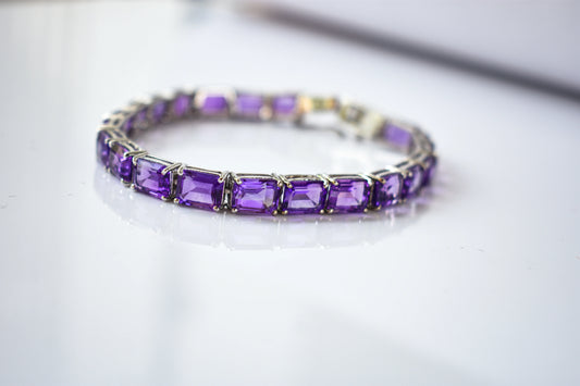 Deep purple emerald-cut gemstone tennis bracelet in 925 silver