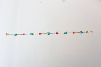 18K gold bracelet with turquoise and ruby stations