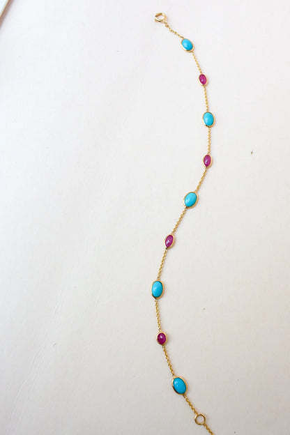 18K gold bracelet with turquoise and ruby stations
