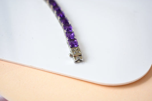 Deep purple emerald-cut gemstone tennis bracelet in 925 silver