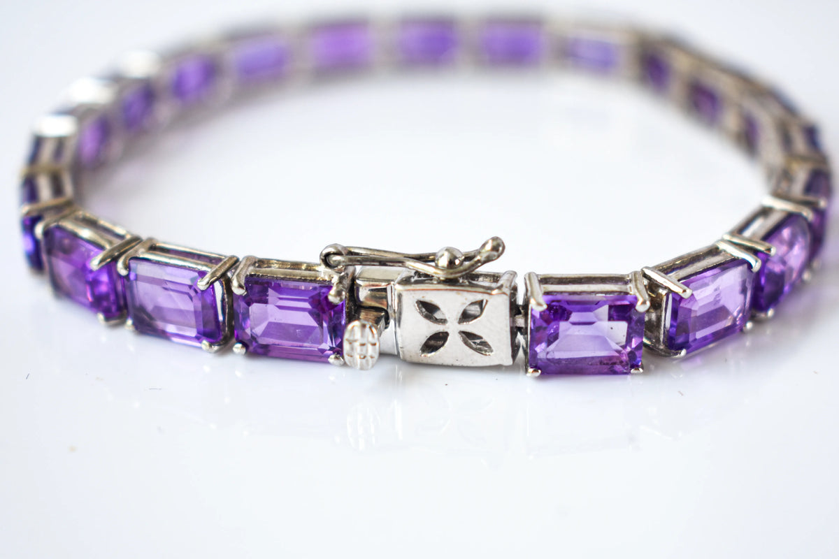 Deep purple emerald-cut gemstone tennis bracelet in 925 silver