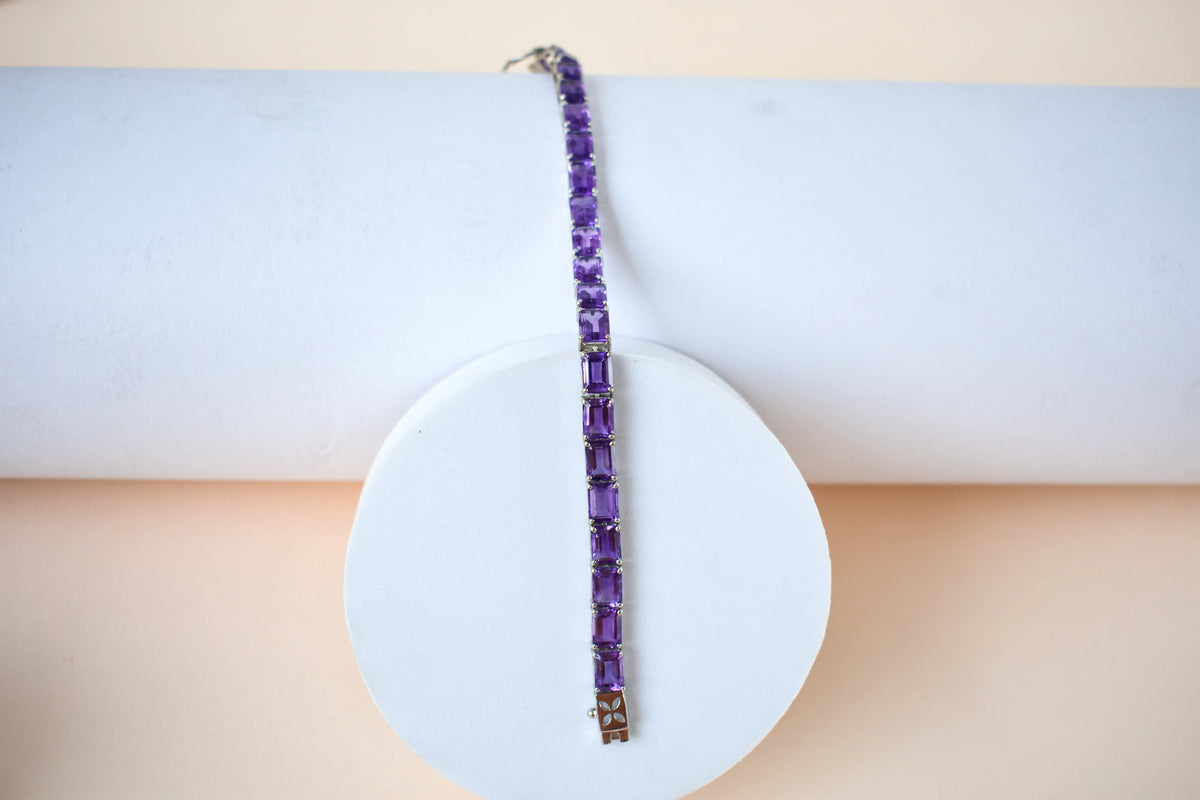 Deep purple emerald-cut gemstone tennis bracelet in 925 silver