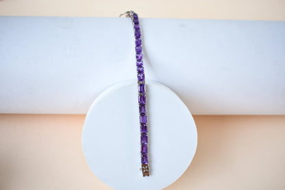 Deep purple emerald-cut gemstone tennis bracelet in 925 silver