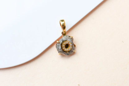 18K gold pendant with rough diamond crystal and pavé diamond halo