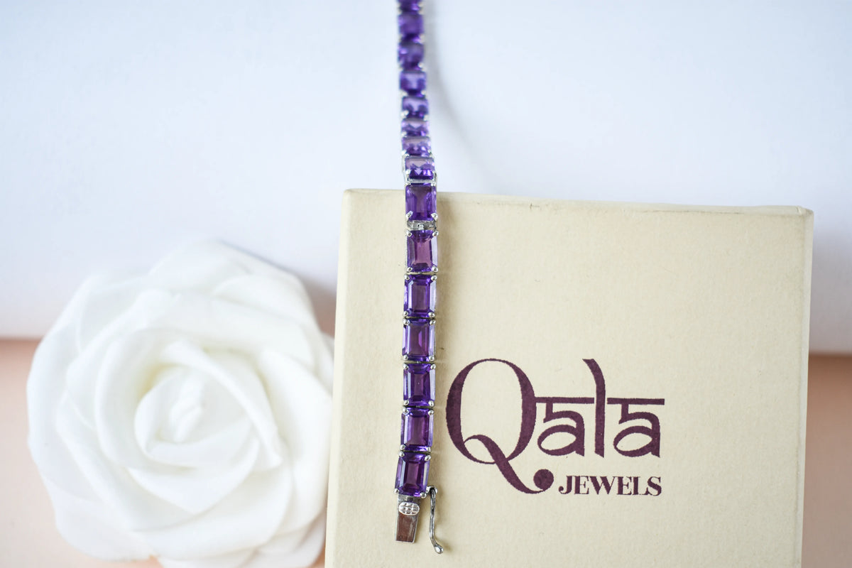 Deep purple emerald-cut gemstone tennis bracelet in 925 silver