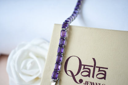 Deep purple emerald-cut gemstone tennis bracelet in 925 silver