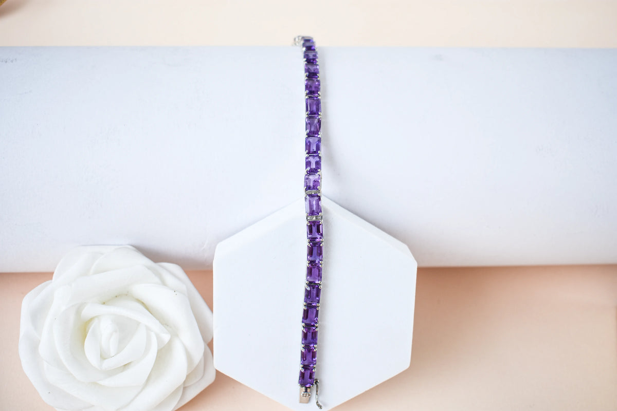 Deep purple emerald-cut gemstone tennis bracelet in 925 silver