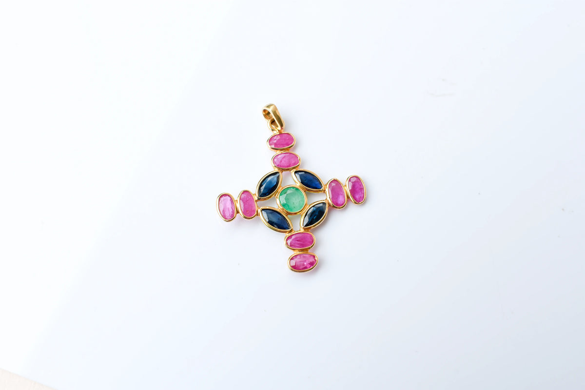 18K gold cross pendant with ruby, sapphire, and emerald