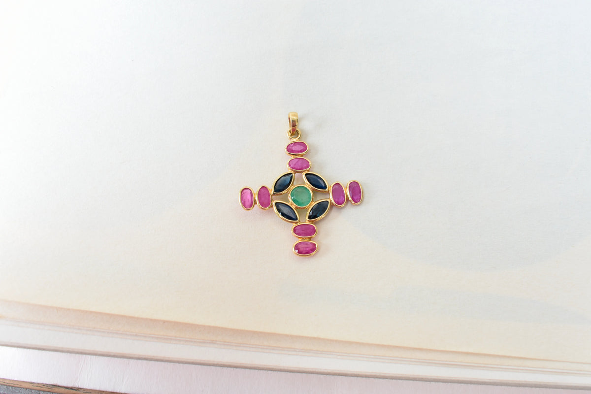 18K gold cross pendant with ruby, sapphire, and emerald