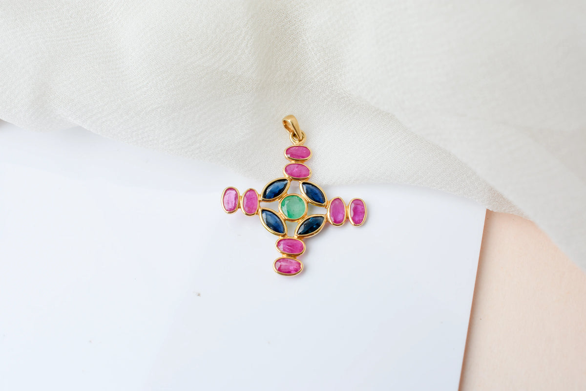 18K gold cross pendant with ruby, sapphire, and emerald