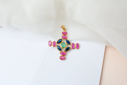 18K gold cross pendant with ruby, sapphire, and emerald