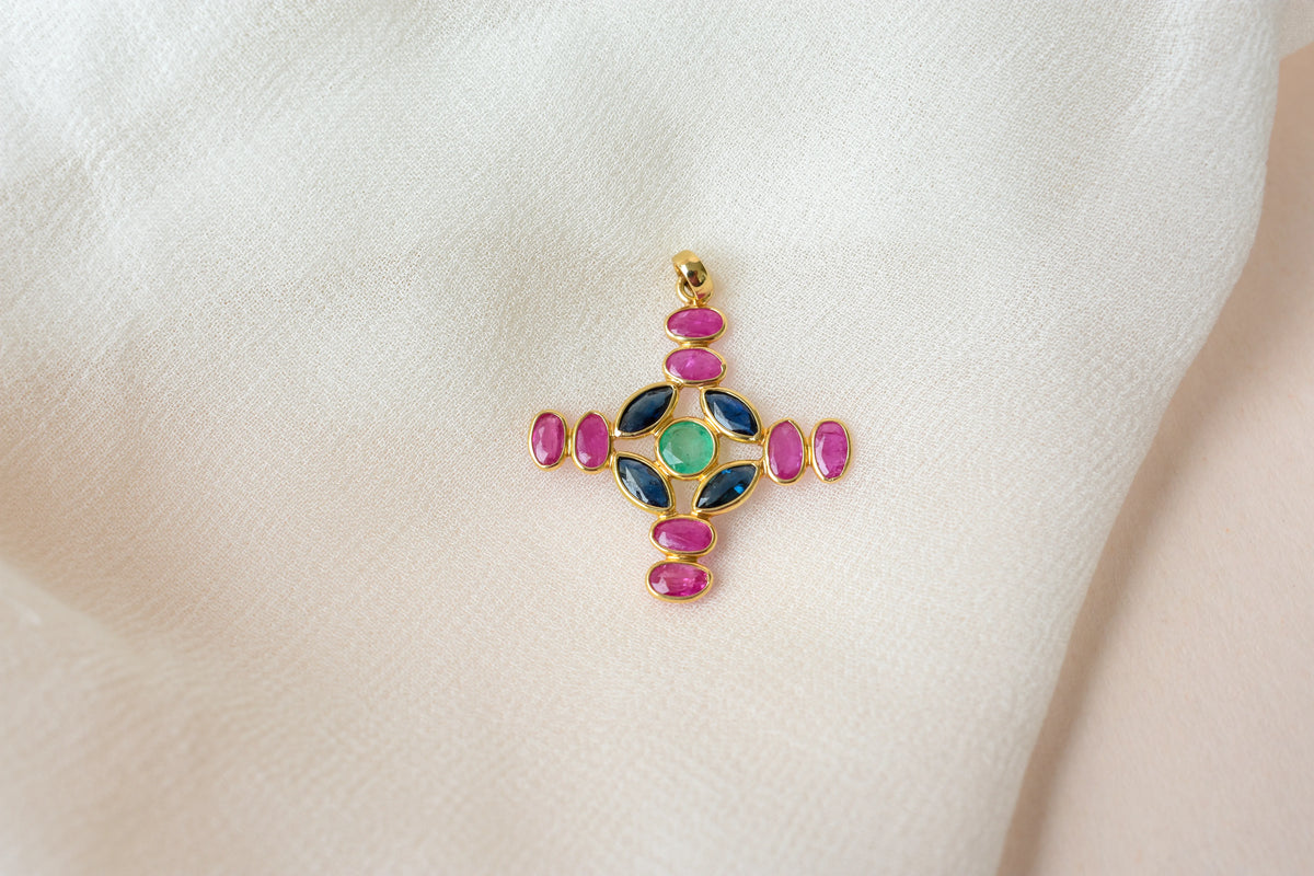 18K gold cross pendant with ruby, sapphire, and emerald
