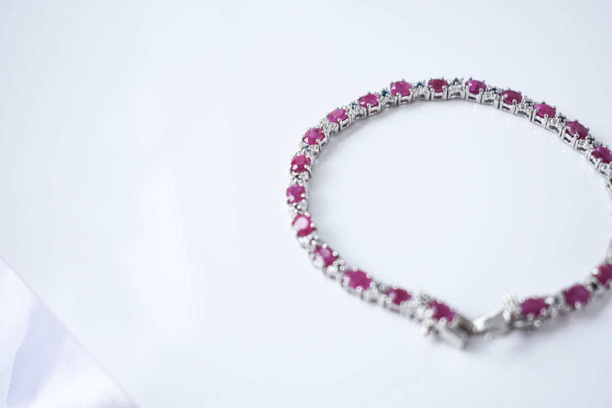 Ruby and cubic zirconia tennis bracelet with round stones set in 925 silver