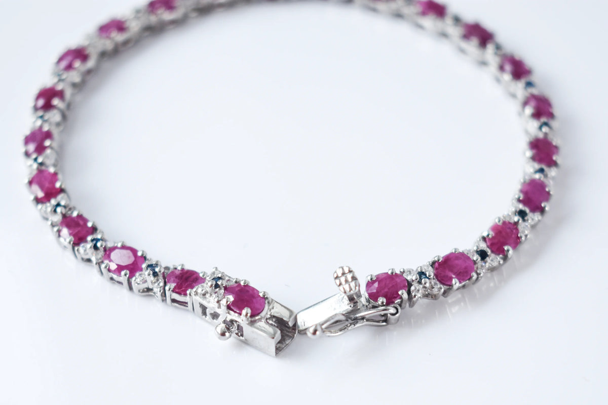 Ruby and cubic zirconia tennis bracelet with round stones set in 925 silver