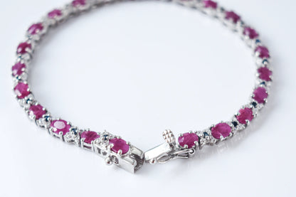 Ruby and cubic zirconia tennis bracelet with round stones set in 925 silver