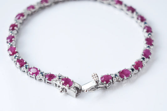 Ruby and cubic zirconia tennis bracelet with round stones set in 925 silver