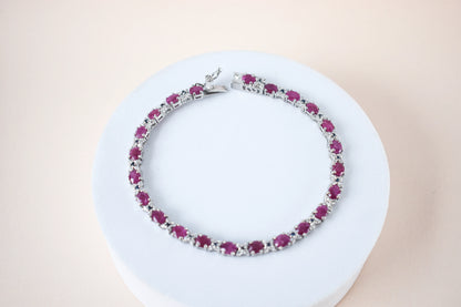 Ruby and cubic zirconia tennis bracelet with round stones set in 925 silver