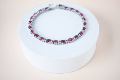 Ruby and cubic zirconia tennis bracelet with round stones set in 925 silver